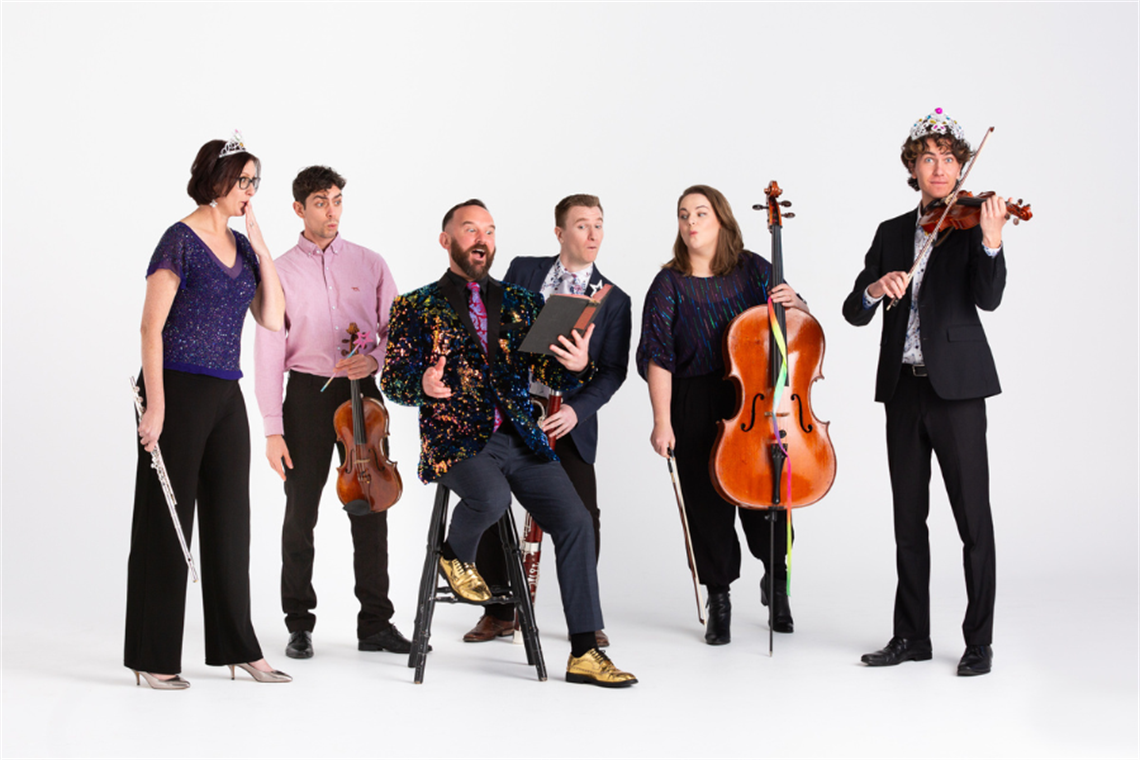 Group of musicians holding various musical instruments