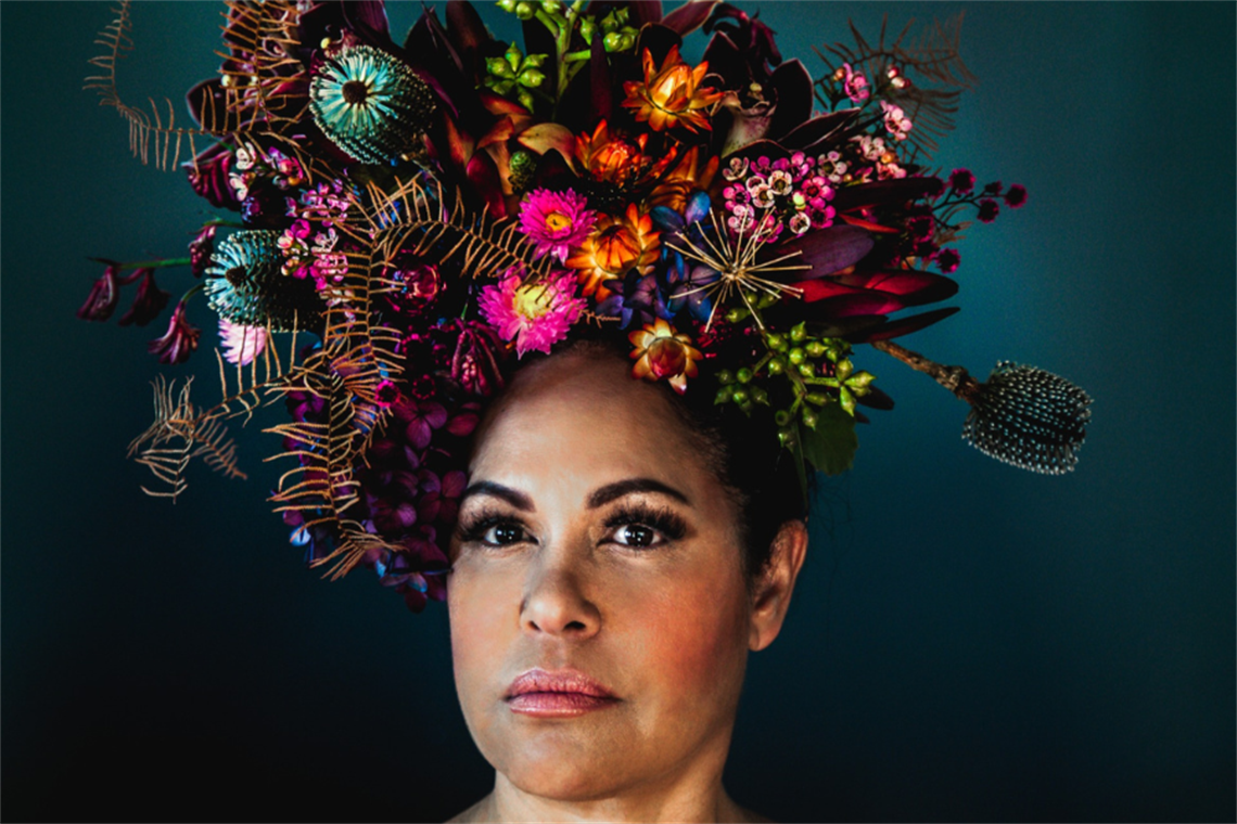 Christine Anu with a flower crown