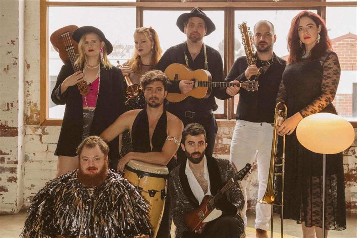 Group of musicians holding various musical instruments